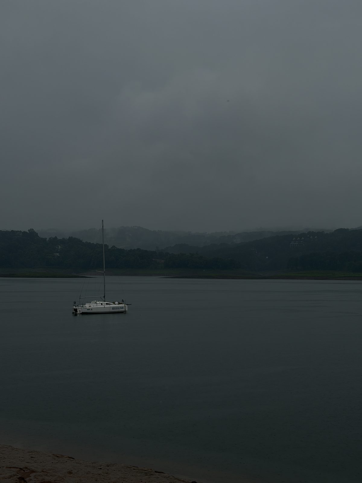 A boat on a misty lake